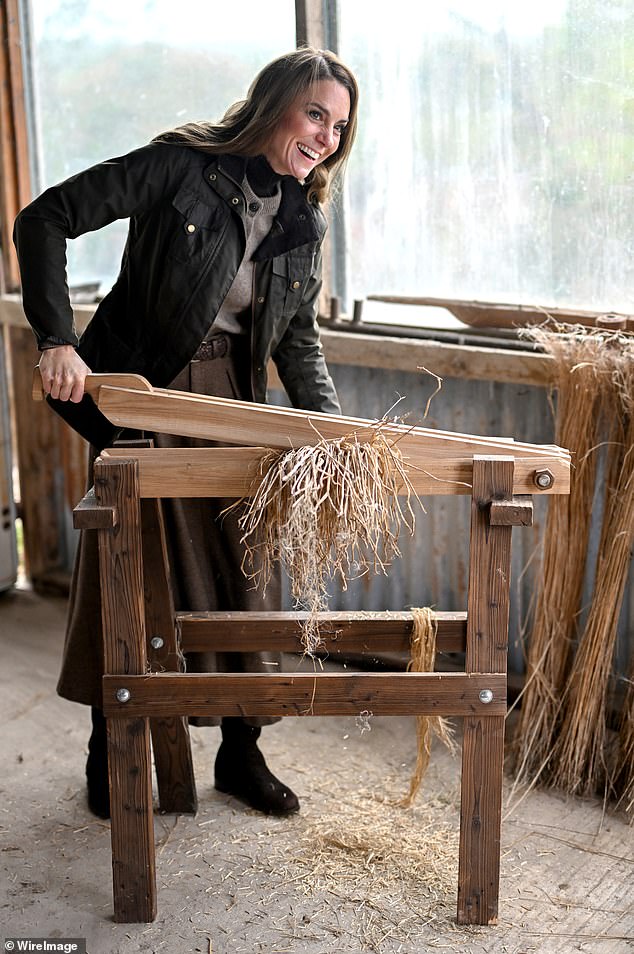The Princess of Wales uses a restored heritage machine that is used for 'breaking and scutching' during her visit to Mallon Farm, a flax farm in County Tyrone