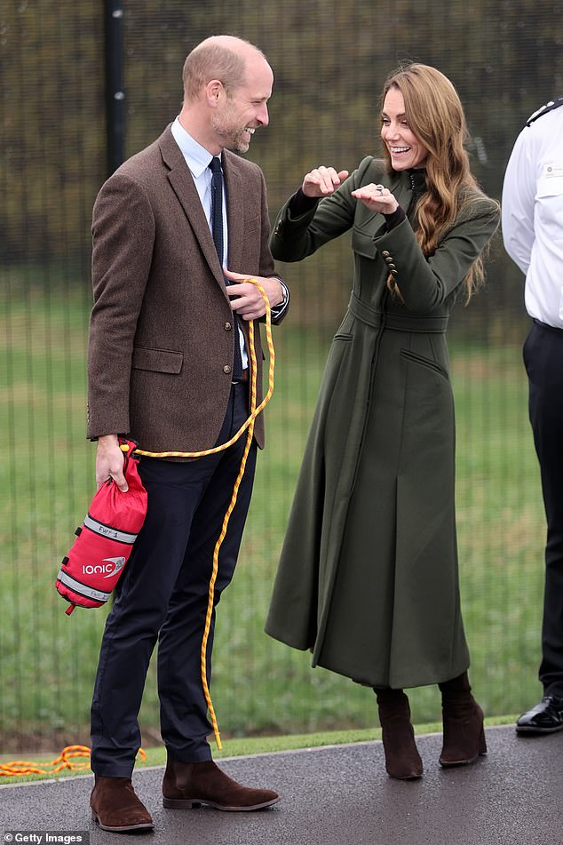 William and Kate couldn't keep the smiles from their faces as they took part in a training scenario at the Northern Ireland Fire & Rescue Service's new Learning and Development College