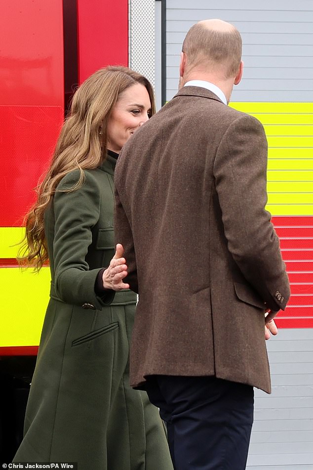 The Princess of Wales affectionately placed her hand on William's back as the couple shared a sweet moment together during their trip to Northern Ireland