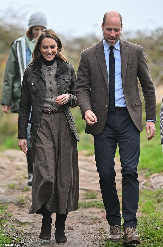 The Prince and Princess share a joke together during their visit to Mallon Farm, a flax farm in County Tyrone
