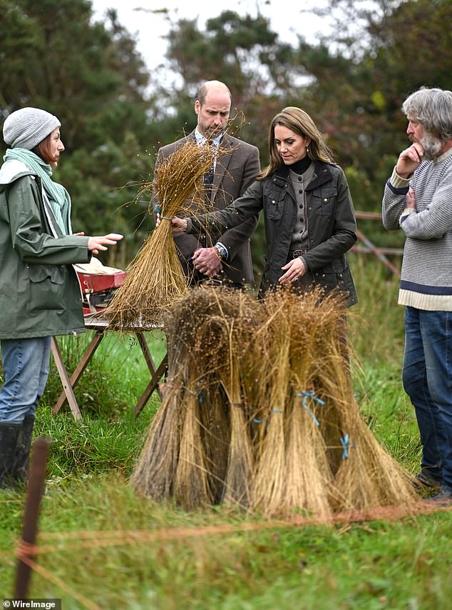 The Prince and Princess of Wales speak with farm owners Helen Keys (L) and Charlie Mallon (R) during their visit to Mallon Farm