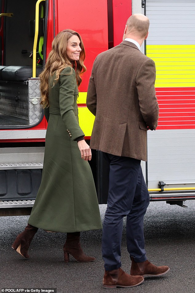 The royal couple looked perfectly in step in coordinated brown suede shoes for their visit