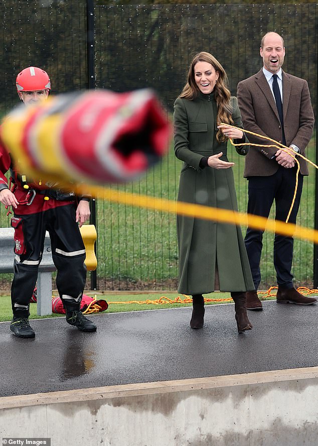 The royal couple (pictured right) appeared fascinated by the drills taking place, with William in particular asking lots of questions about the equipment