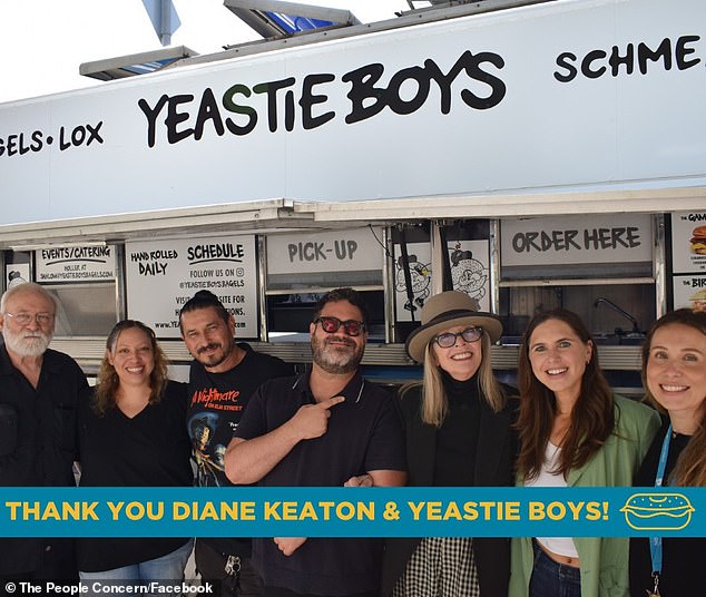 In an exclusive interview with The Daily Mail, Fox (pictured center) says Diane assisted his food truck staff in handing out food