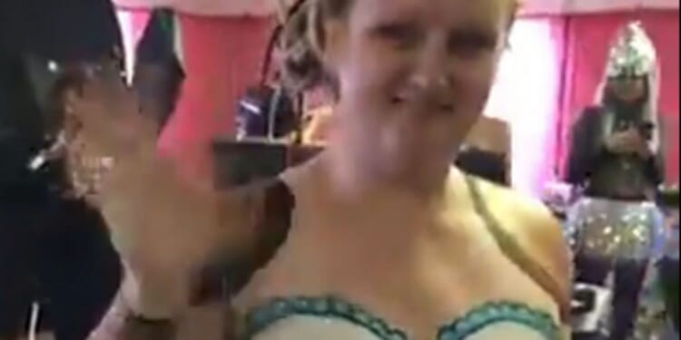 Model who tried to sue NHS for £3m over 'botched' op is jailed after she was caught 'strutting' at festival