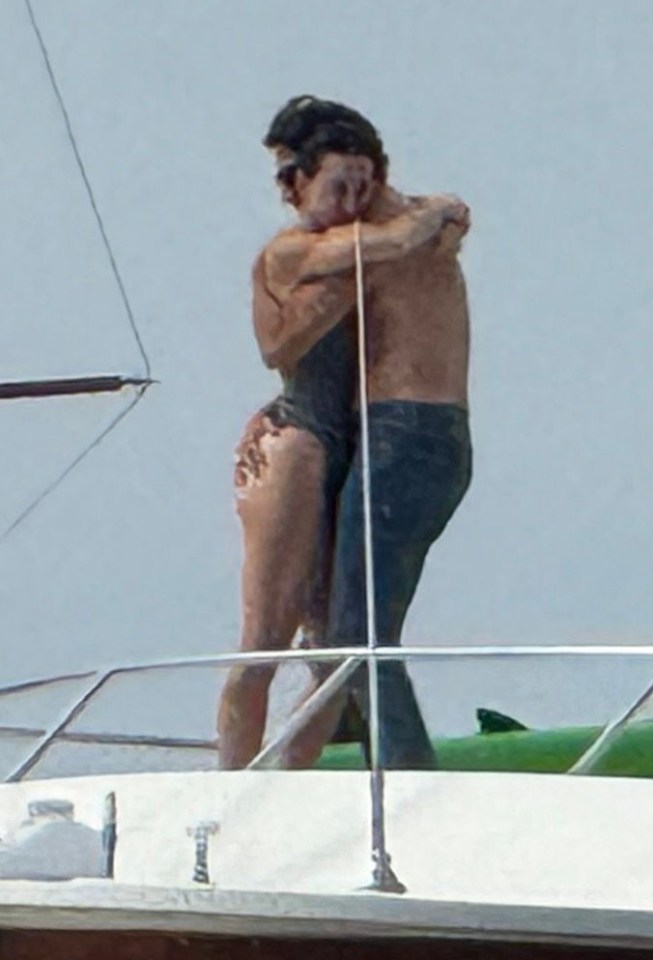 Katy Perry and Justin Trudeau embracing on a yacht.