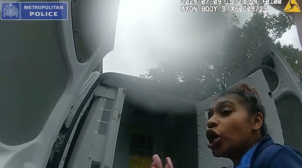Body camera footage from an officer showing Nazli Merthoca, 24, talking to the officer with a police van door open in the background.