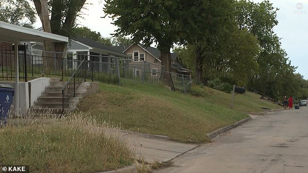 The woman was taken from the front door of a Wichita home on Sunday at about 2am