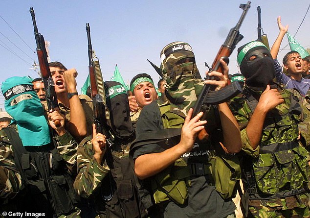 Hamas fighters (file photo).  'They will disarm ¿ and if they don't I'm gonna make them disarm,' the president told reporters at the White House on Tuesday. 'They know what I mean.'