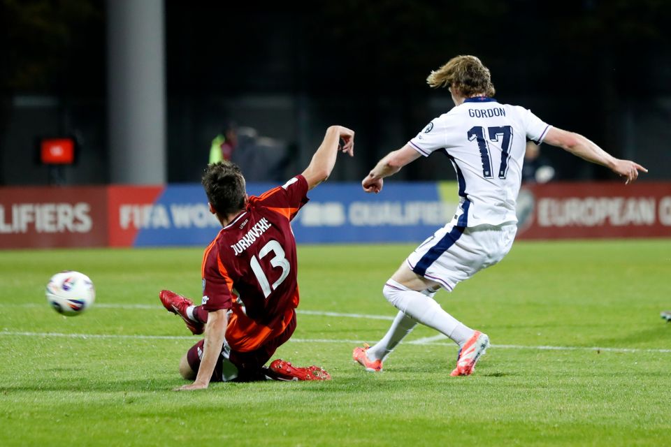 Anthony Gordon of England scoring the opening goal against Latvia.