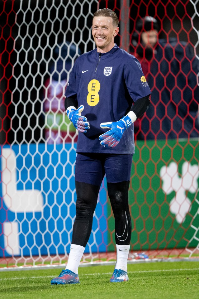 Jordan Pickford smiling during warm-up.