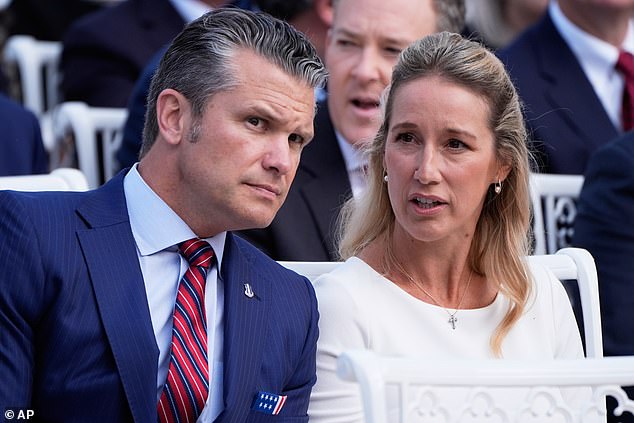 Defense Secretary Pete Hegseth talks to his wife Jennifer Rauchet