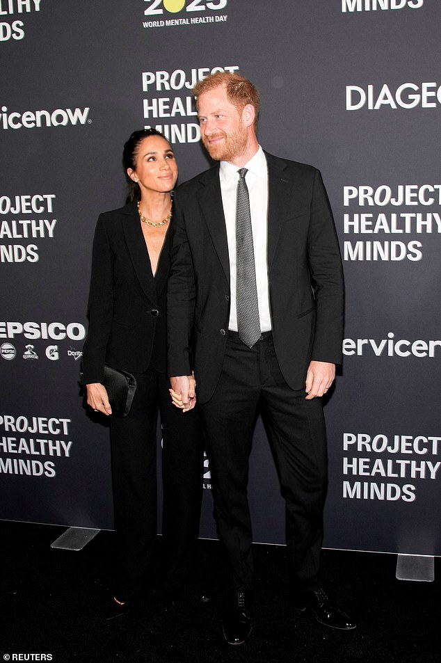 Prince Harry and Meghan before getting their Humanitarians of the Year award on Thursday night