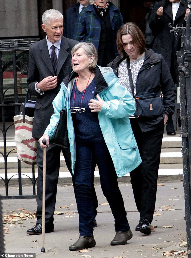 Evelyn Overton, 74, her husband has been accused of shoving Mrs Hayes to the ground, kicking her in the groin, and firing a shotgun over her garden