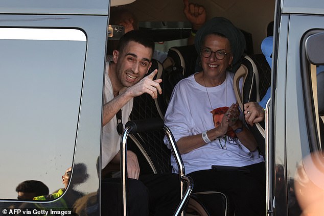 Released Israeli hostage Avinatan Or greets well-wishers upon arriving at Beilinson Hospital in the Rabin Medical Centre in Petah Tikva in central Israel on October 13, 2025