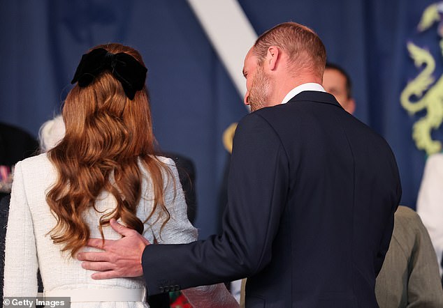 The pair were seen placing their hands on one another's backs in a supportive gesture throughout the event at the Horse Guards Parade to celebrate VE Day in May