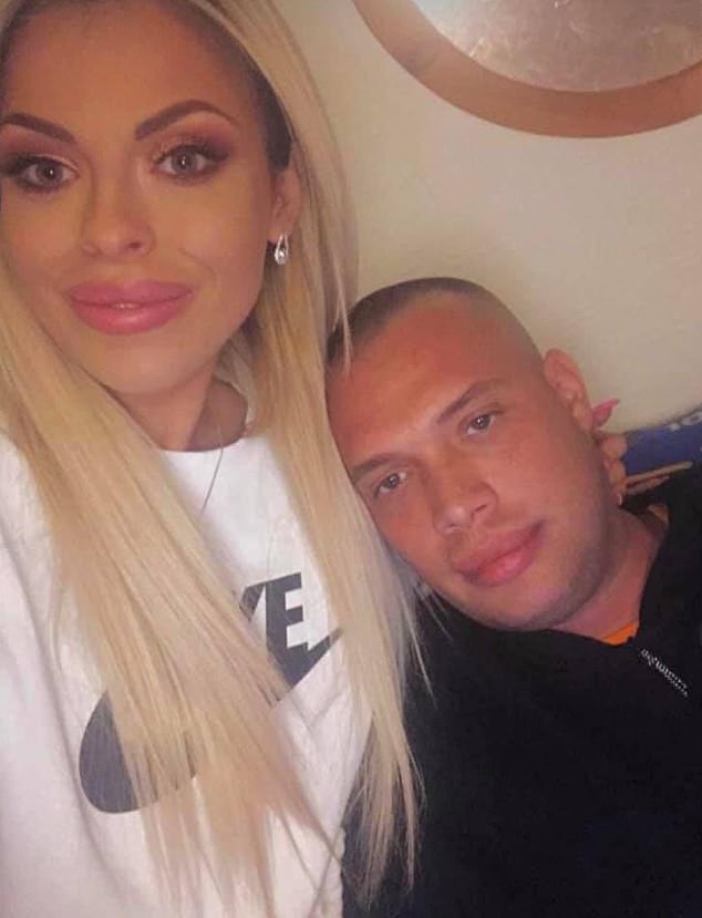 Annie Webster wired £6,066.85 to her partner Shawn O'Malley, who was linked by police to a shooting in Bolton on September 9, 2019. Pictured are the couple in a photo believed to have been taken at her Warrington home. It is not clear when the photo was taken, though it was posted on her Facebook account this year