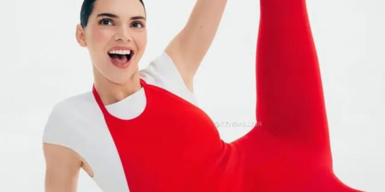 Kendall Jenner shows off her flexibility in red look as she poses with futuristic face mask in new beauty campaign