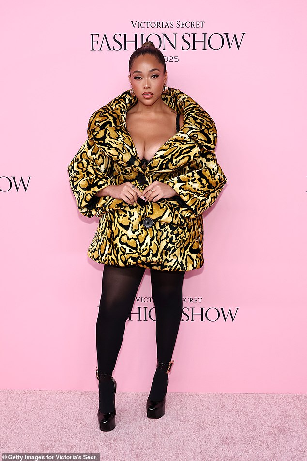 Kylie Jenner's former BFF Jordyn Woods, 28, rocked a cheetah print puffer coat, black tights, and platform heels