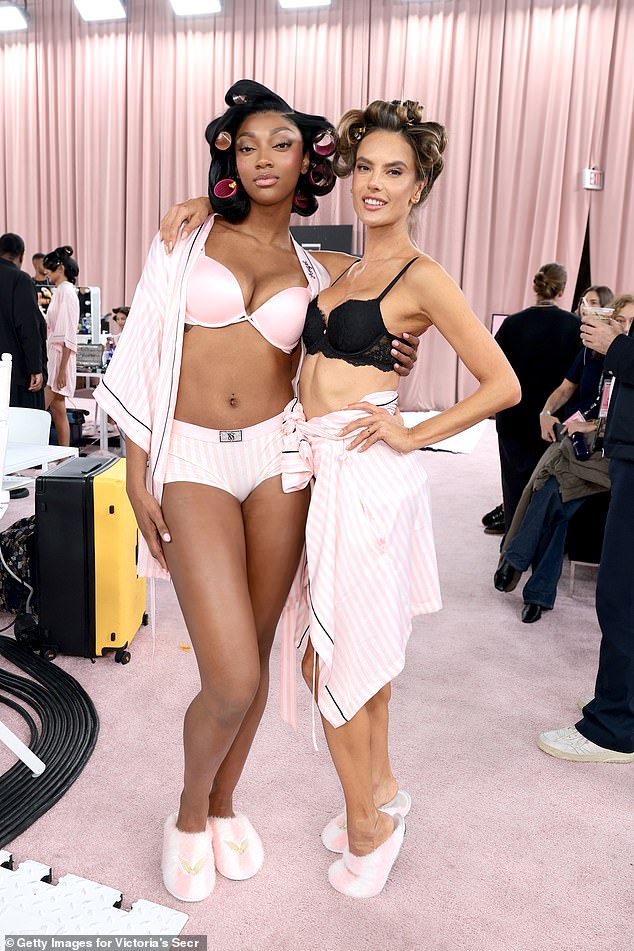 They had their hair up in rollers and sported Victoria's Secret bras as they got ready for the runway