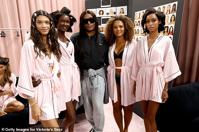 (L-R) Marina Moioli, Abeny Nhial, Law Roach, Ashlyn Erickson, and Blesnya Minher pose backstage