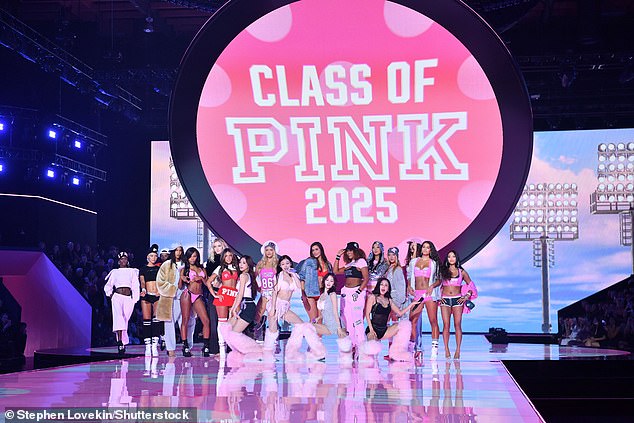 Iris took to the stage with several other models with a large banner reading 'Class of Pink 2025' behind them