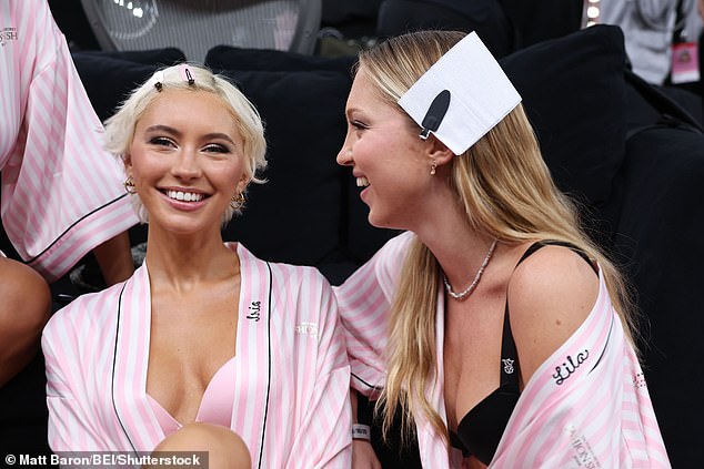 Iris accessorised with a pair of gold hoop earrings