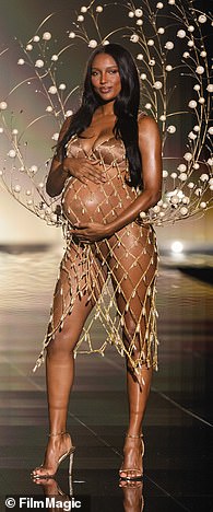 Angel Jasmine Tookes opened the show while nine months pregnant