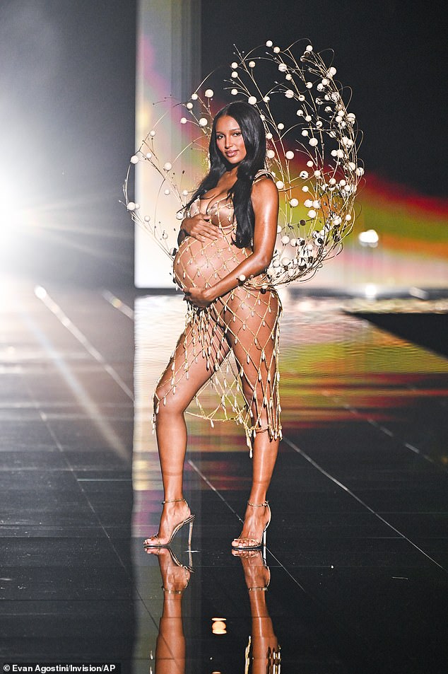 Instead of wings, she had a wire-frame clam shell decorated with enormous pearl-like beads