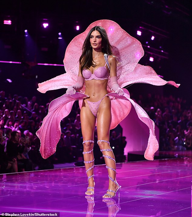 Emily Ratajkowski made her debut on the Victoria's Secret runway in a lavender lace bra and thong, along with heels that strapped up her legs