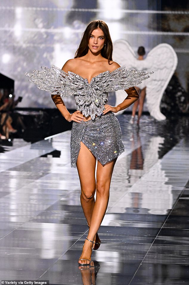 Barbara Palvin had all eyes on her with a sparkling silver top shaped like a bird in flight, which she wore with a silver sequined mini skirt highlighting her long legs