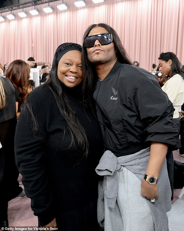 Celebrity stylist Law Roach (R) caught up with makeup artist Pat McGrath backstage