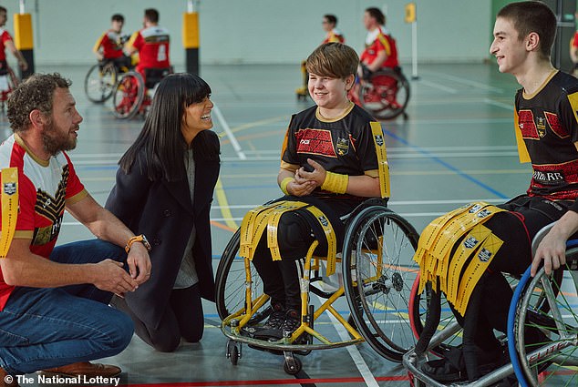 Between her presenting duties on the BBC's two biggest shows, she travelled the country to see firsthand the impact National Lottery players have on their local communities (Claudia visiting a wheelchair rugby club in Wales)
