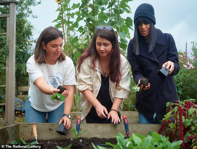 Claudia has partnered with The National Lottery to highlight the good causes funded whenever someone buys a ticket (Claudia pictured with Sheffield based charity, Bloom)
