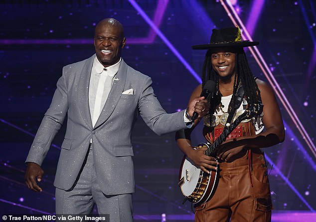 Mr Ladson (pictured next to Terry Crews) rose to fame on season 20 of America's Got Talent earlier this year