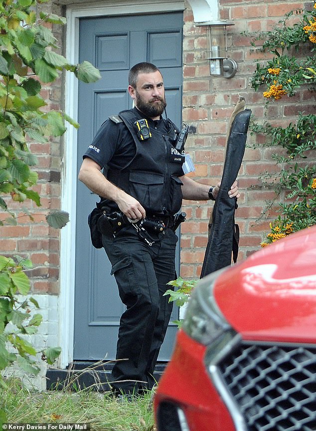 Several rifles or shotguns were removed by officers. There is no suggestion they were not being held legally and securely