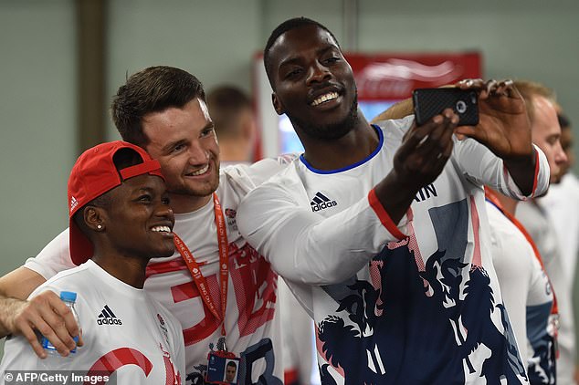 He was part of Team GB for the Rio Olympics in 2016 (pictured here with fellow boxers Nicola Adams and Lawrence Okolie) but lost in the first round to Kazakhstan's Janibek Alimkhanuly