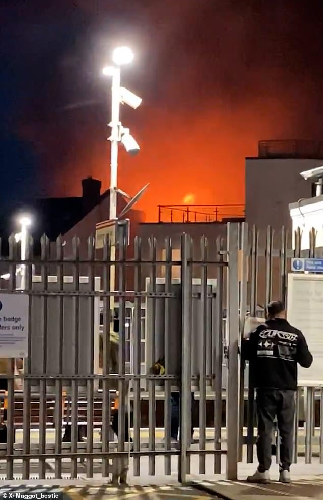 Shocking pictures show enormous orange flames and huge billowing clouds of black smoke