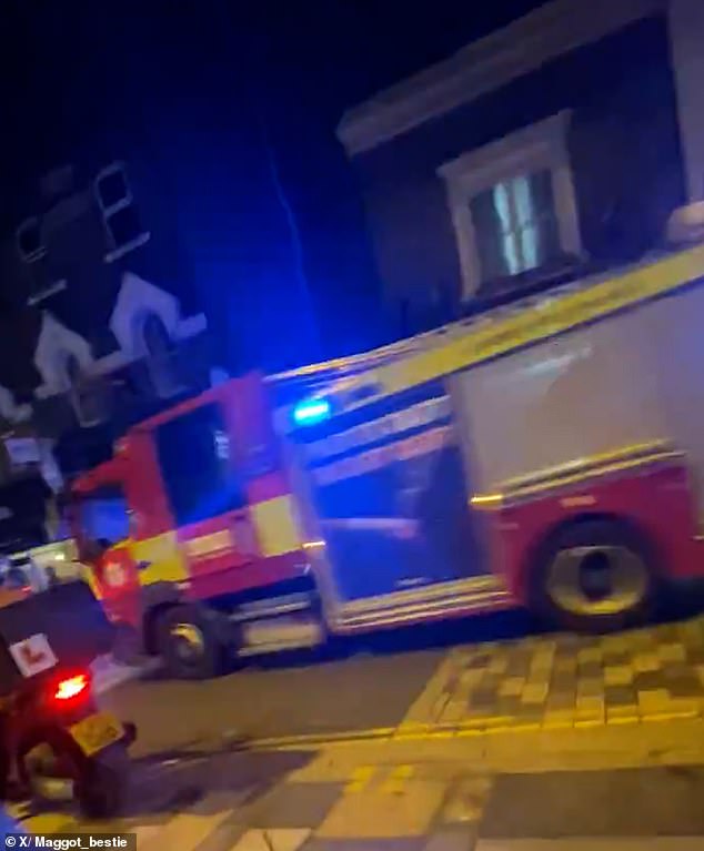 Around 100 firefighters and some 15 fire engines (pictured) from the London Fire Brigade are attempting to put out the blaze