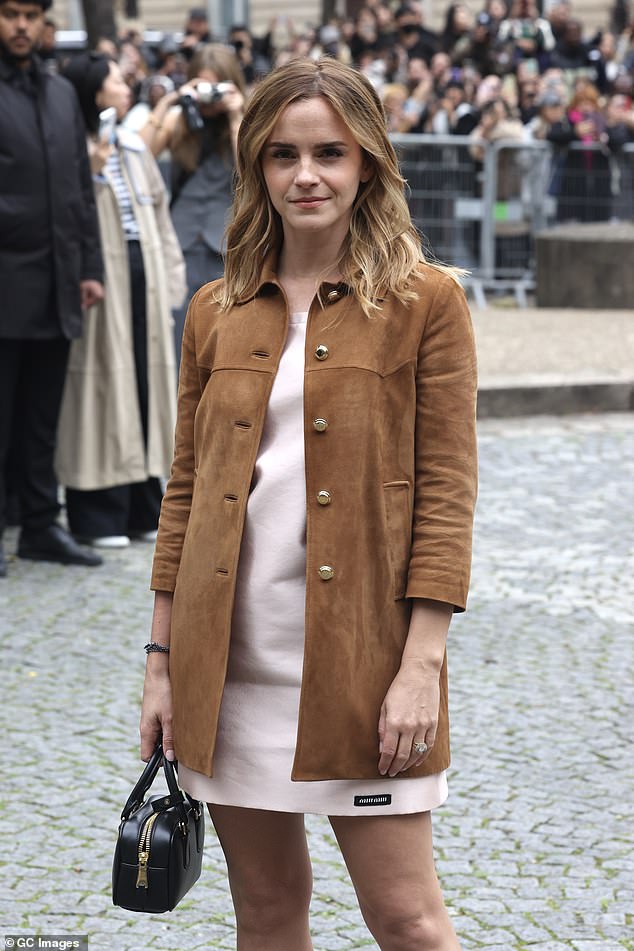 Earlier this month Emma set tongues wagging when she wore a vintage-style diamond ring on her wedding finger at Paris Fashion Week