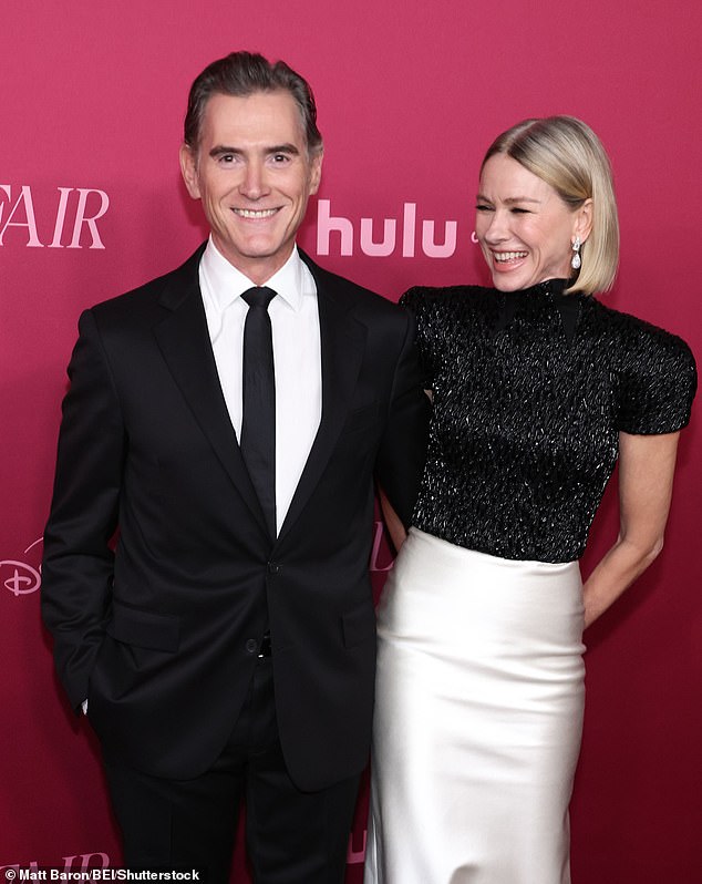 He looked dashing in a dark suit