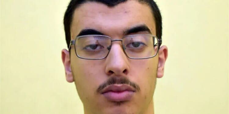 Manchester bomb plotter pleads not guilty to carrying out 'terror' attacks on prison officers with cooking oil