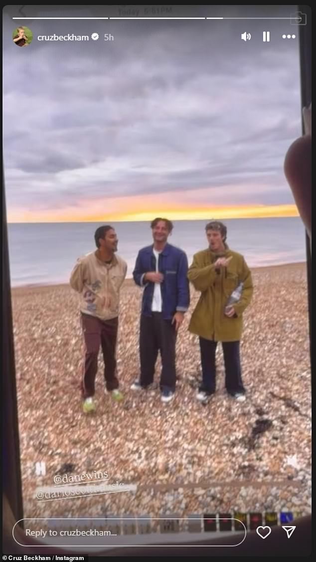 His bandmates also shared snaps as they larked about on the beach ahead of the show, with Cruz embracing Jackie who turned heads in a long faux fur coat.