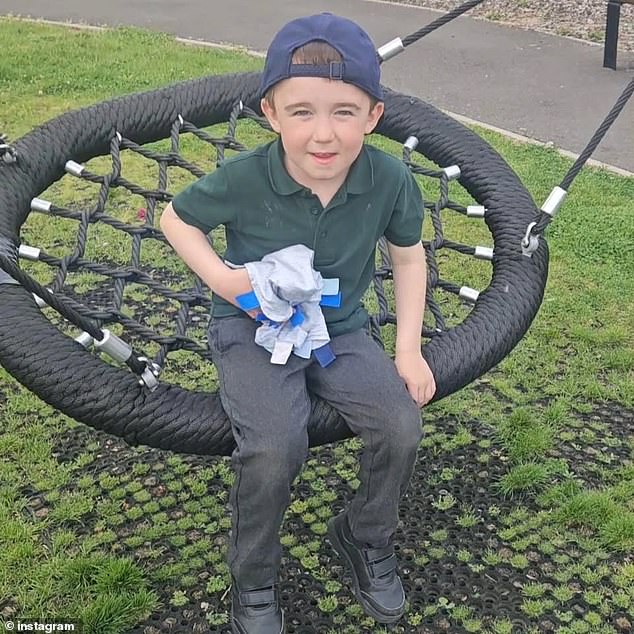 Button has also previously shared a series of sweet photos of her young son, with one (pictured) posted to Instagram of him on a swing in the playground in his school uniform. The caption reads: 'Cannot wait to see my Son xxx'