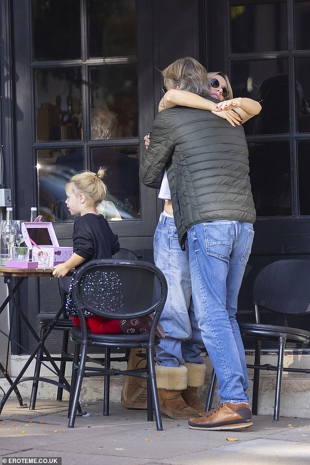 The TV presenter greeted Chloe with a sweet hug before sitting down and enjoying a glass of vino