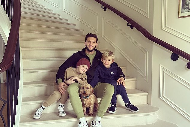 The former England player (pictured with his two sons) bought the luxury seaside property with his wife Emily following his move from Liverpool to Premier League rivals Brighton