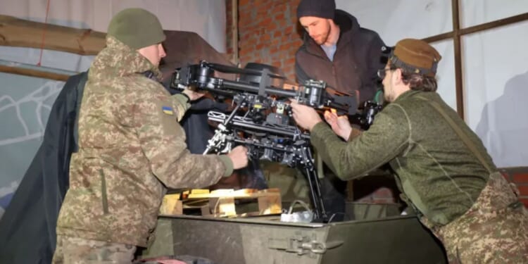 Soldiers on Ukraine's frontline using remote controlled trucks for supply runs as Putin's deadly drones patrol skies