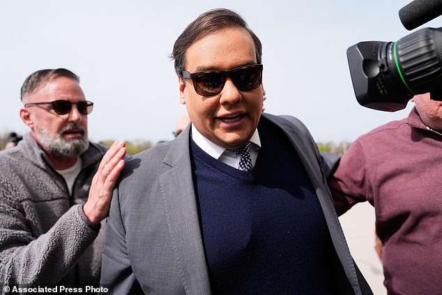 Santos is seen arriving at federal court for sentencing in April  in Central Islip, New York