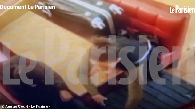 She chatted with a man while a large trunk, allegedly carrying Lola's body, lay on the tiled floor. Benkired then pointed to the suitcase, opened it a crack, and seemed to urge him to look at its contents