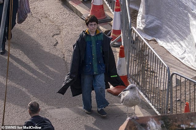 The new wizarding stars have been spotted filming in Cornwall (McLaughlin seen on set above) in the recent months